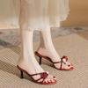 In the Summer of 2025, the New Square-headed Open-toed Stiletto High-heeled Sandals Are Worn by Women with Skirts and High-heeled Sandals.