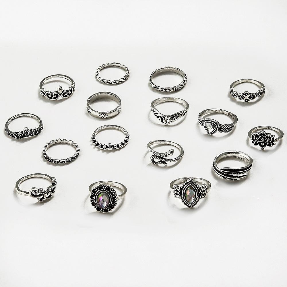 Европа и Соединенные Штаты Новое кольцо в стиле ретро с преувеличенной полостью и резным пером в форме змеи, комбинированное кольцо из 16 предметов, внешняя торговля
