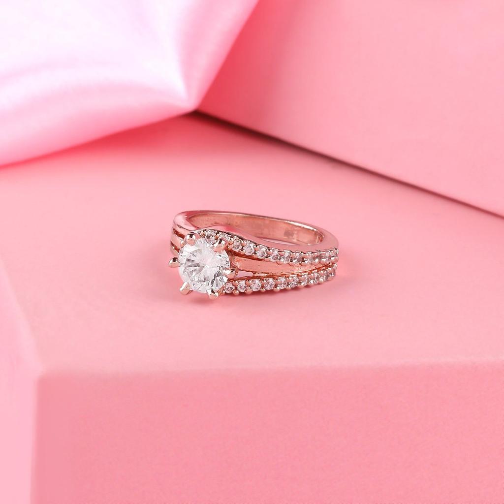 Женское красивое кольцо-пасьянс Estele с покрытием из розового золота и цирконием на палец