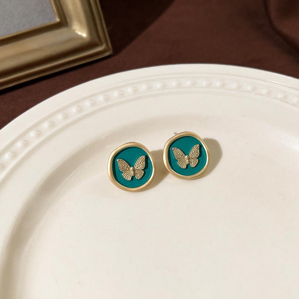Изумрудные серьги-пусеты в стиле ретро середины века