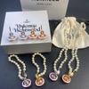 Vivienne Westwood High-Quality Saturn Pendant Pearl Enamel Necklace and Earrings - Minimalist, Niche, High-End Accessory Set