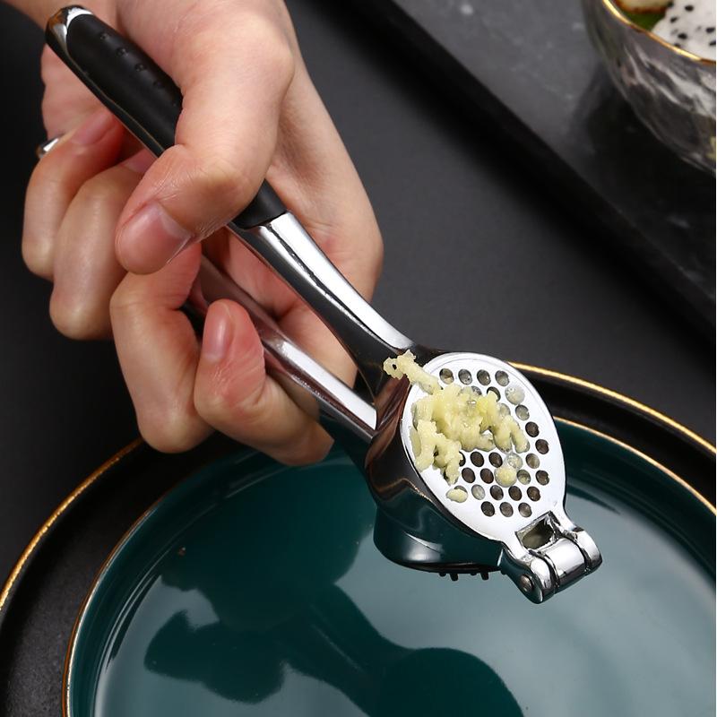 Household garlic masher for pressing garlic in kitchen thickened zinc alloy manual pull multifunctional garlic masher