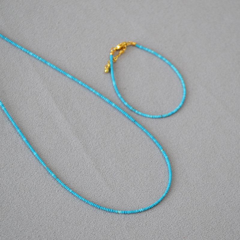 Французский нишевый ретро литературный и художественный ультратонкий бирюзовый летающая тарелка из натурального камня с бусинами простой темпераментный высококлассный комплект колье и браслета