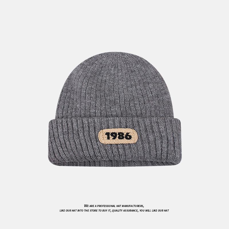 Осенне-зимняя мода Универсальная вязаная шапка Большой окружности головы Теплая защита ушей Шерстяная шапка Пара Холодная шапка