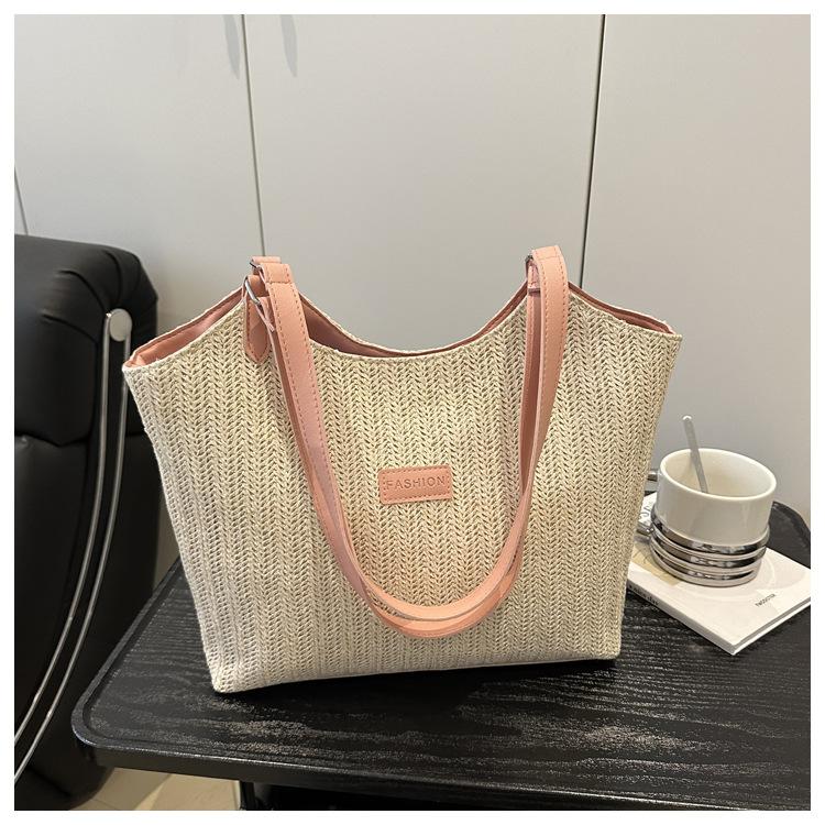 Повседневная текстура простая 2025 новый тканый модный тренд летний дизайн большая вместимость женская плечевая сумка-тоут