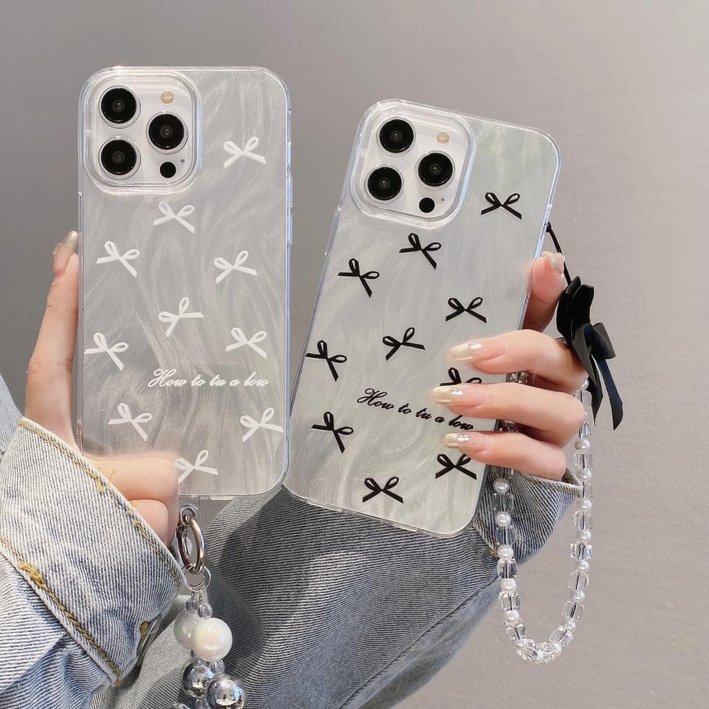 Suitable for Apple 15pro Bracelet Bow Protective Cover for IPhone 11 Laser 14 Feather Yarn Mobile Phone Case 16