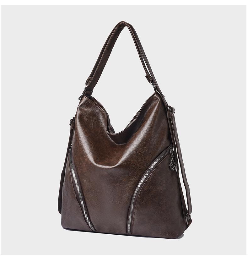 Women's Versatile Luxury Backpack: Large Capacity Textured Shoulder & Crossbody Tote Bag