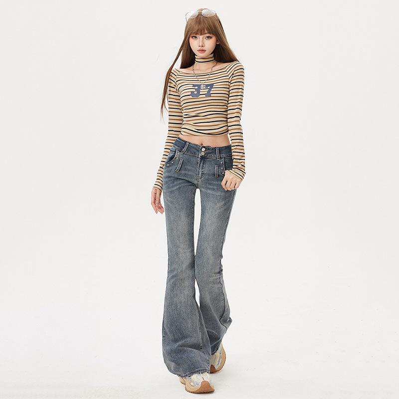 Retro washed micro-pull jeans women's spring and autumn spice girls slim and thin niche design pants blue and gray trousers
