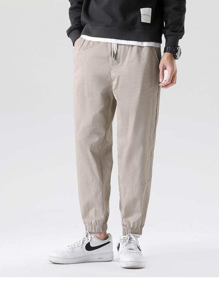 High twist wrinkle resistant cotton toe binding men's sports pants, loose tapered casual pants
