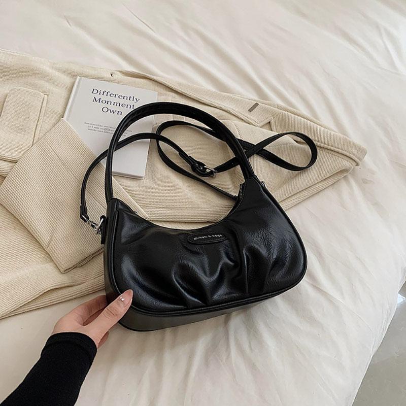Корейская версия подмышечная сумка складная искусственная кожа однотонная женская сумка нишевый дизайн чувственная текстура одно плечо сумка простая новая