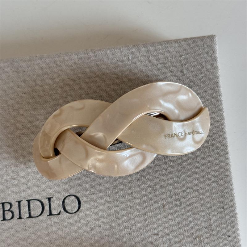 Korean version fashion French retro twist woven shape large ponytail spring clip disc hair top clip hair accessories new