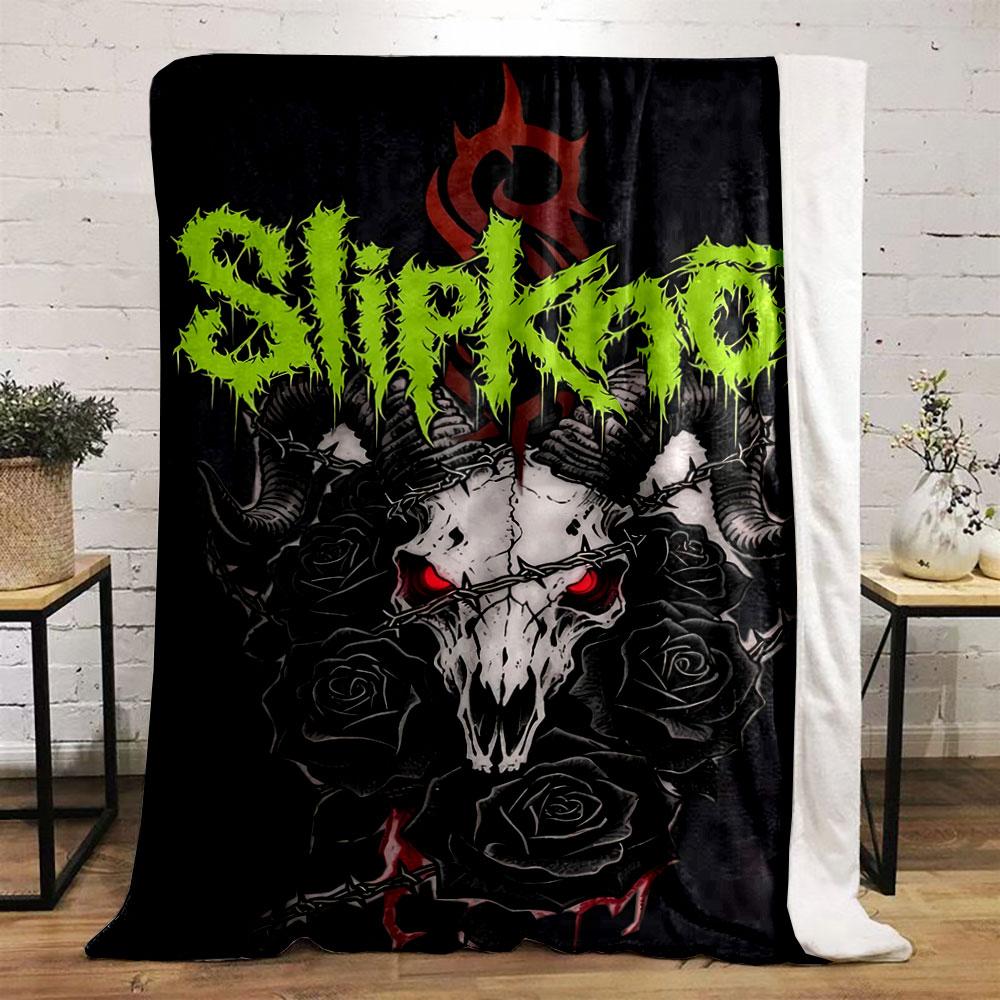 A demonic skull with horns, red eyes, black roses, and barbed wire. for all seasons blanket lunch break throw gift
