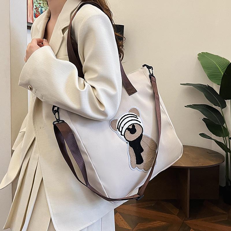 Большая вместительная сумка-тоут для женщин, новая симпатичная универсальная сумка через плечо для женщин, сумка-тоут для студентов колледжа