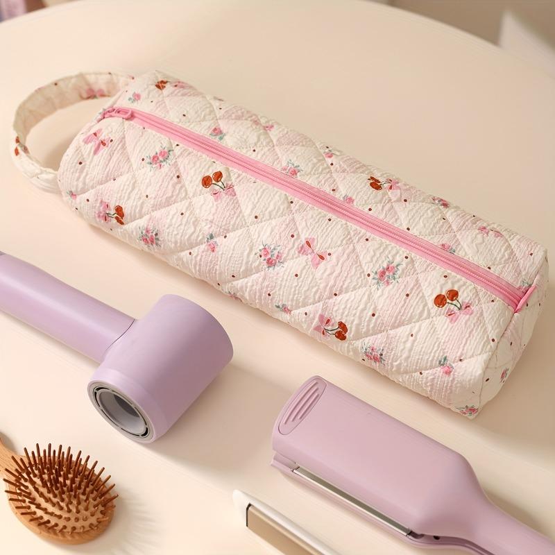 Bow-design hair tool storage bag with zipper. Dustproof for hair dryers and styling tools, ideal for travel and daily use.