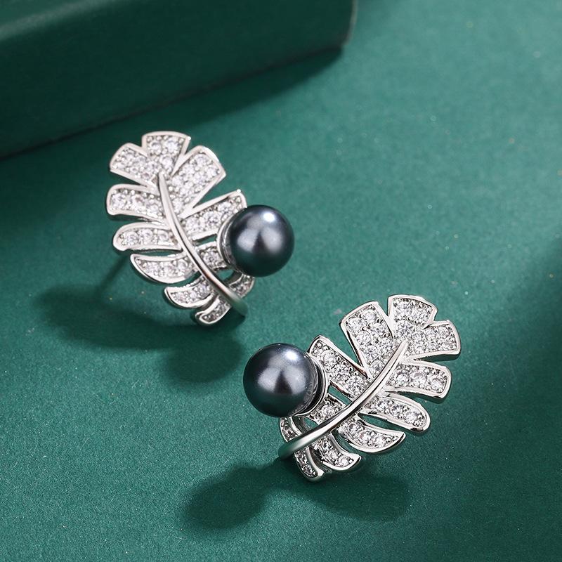 Imitation natural freshwater pearl feather ring European and American S111 silver needle earrings zircon Tahiti necklace women's