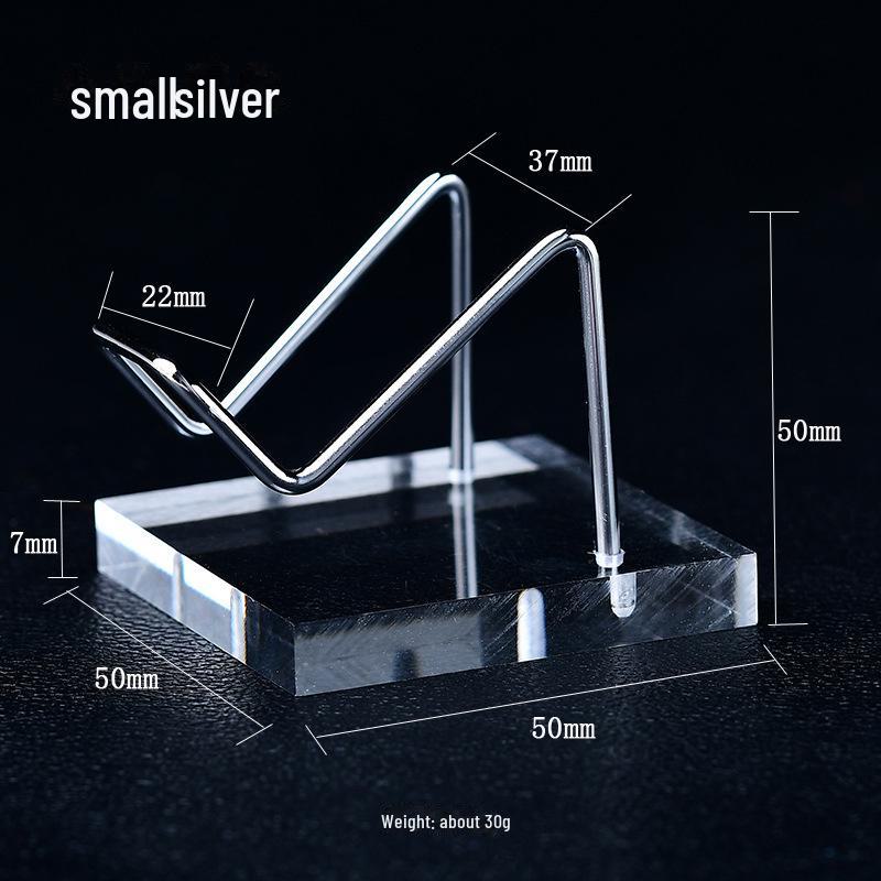 Необработанный кристалл нефрита с акриловой основой на железной художественной стойке