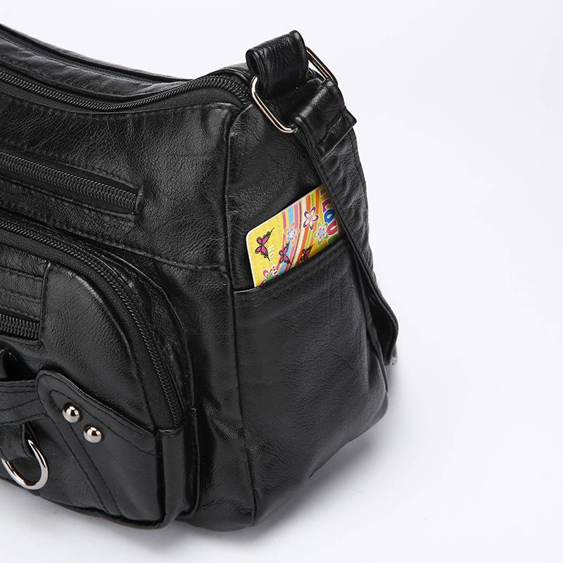 Женская сумка через плечо из мягкой кожи с несколькими отделениями и карманами