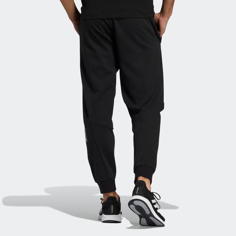 adidas Спортивные брюки мужские черные умеренные HE2911