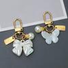 Elegant Pearl Keychain Luxury Shell Flower Leaf Pearl Keyring Handbag Charm DIY Car Key Accessories for Women Stylish Gift