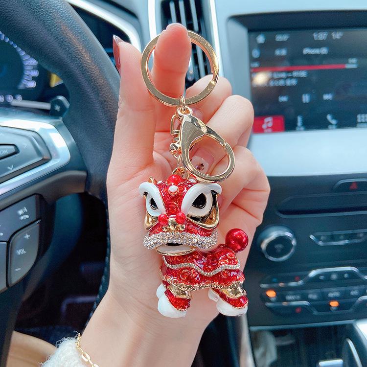 "2023 Red Series God of Wealth Keychain: Creative Money Bag for Car Keys, Annual Meeting Gift with Custom Logo Engraving"