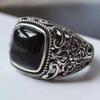 Bold Men's Ring: Retro 925 Silver-Plated Adjustable Obsidian Ring with Creative Design