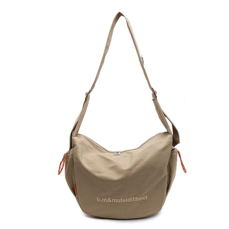 Popular canvas bag women 2026 new commuter versatile casual messenger bag to work large capacity shoulder bag
