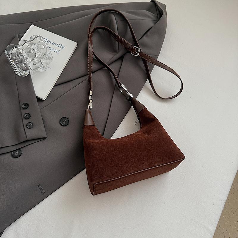 Модная сумка-пельмень для ручной носки женская 2025 осень и зима корейская ins простая универсальная сумка через плечо нишевый тренд сумка-мессенджер