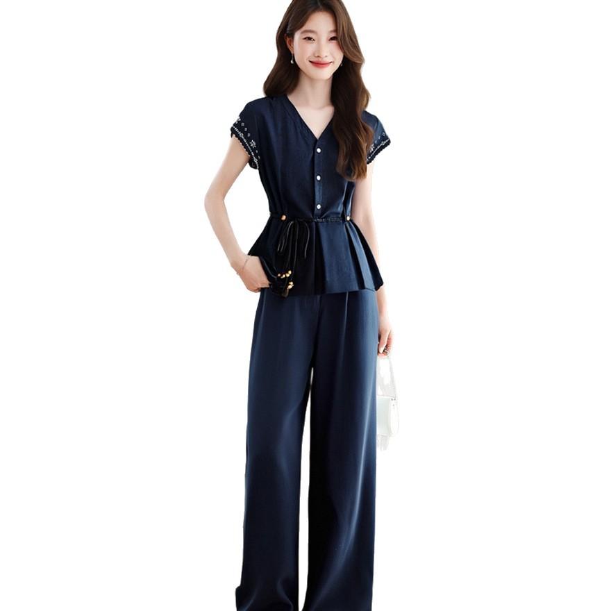 Модный женский костюм новый темперамент V-образный вырез тяжелая промышленность вышитый топ брюки клеш костюм-двойка