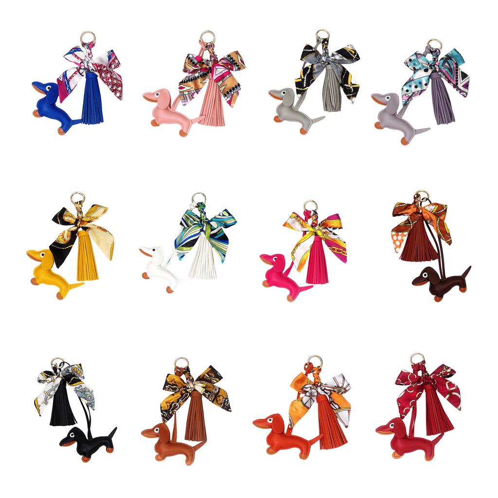 Стильная подвеска в виде таксы с мягкими кожаными кисточками, держатель для ключей с бантом, модный шарм, идеально подходящий для сумок или украшения автомобиля