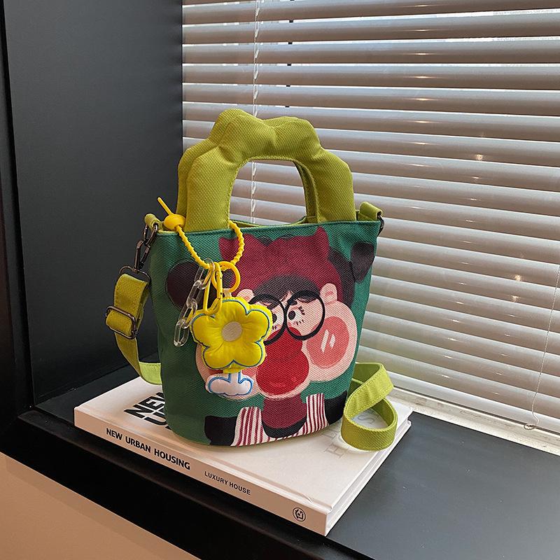 2025 Трансграничная мультяшная сумка-граффити: Нишевый дизайн Сумка-ведро на плечо и через плечо женская