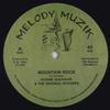 12-дюймовая пластинка HUGHIE IZACHAAR, ORIGINAL ROCKERS - Mountain Rock / She Gimme Love TRSMM121 Melody Muzik 2019 Европа Регги, Ска и Даб
