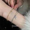 Корейский двухслойный браслет с подвеской-крестом из диоксида циркония - Элегантный и универсальный.