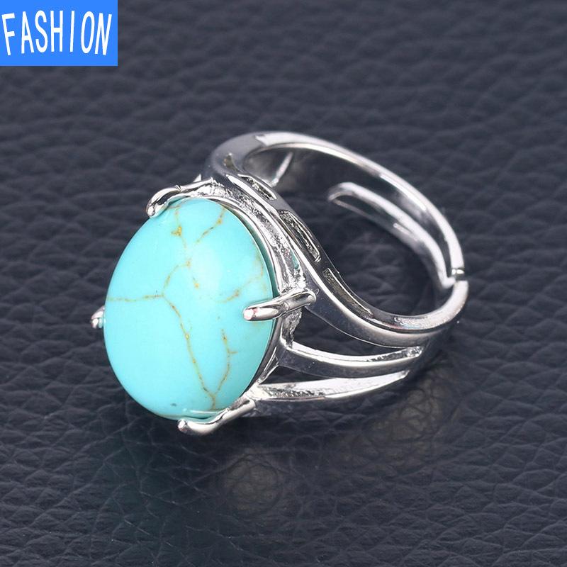 Oval Natural Crystal Four-claw Inlaid Hollow Ring