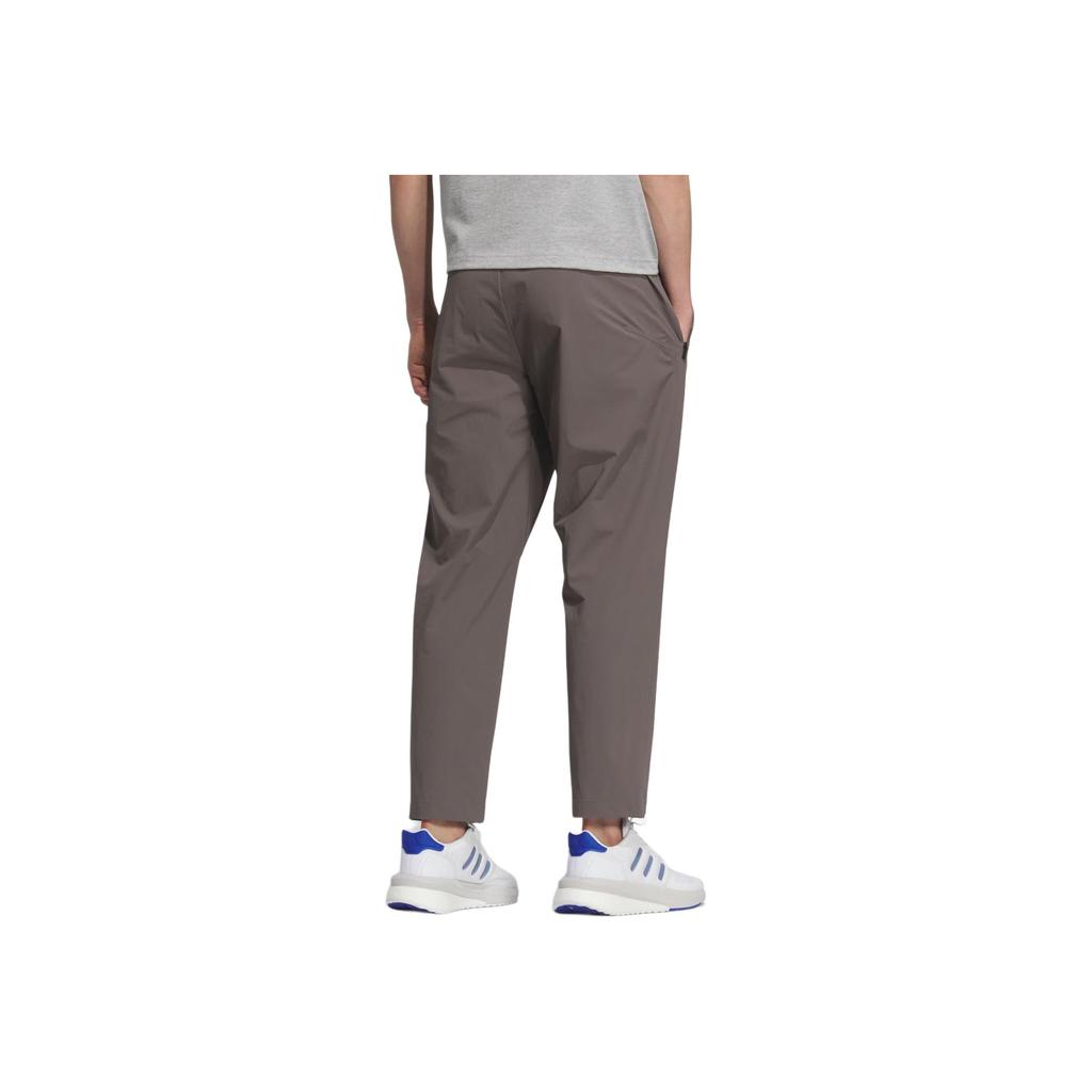 Adidas SS25 Motion Tracksuit Bottoms Fashion Versatile Solid Color Tapered Sports Casual Pants Men Bottoms KE6007