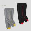 Весна 2025 г. Детские корейские спортивные штаны с цветными блоками: Спортивные брюки из хлопка для мальчиков, модный дизайн
