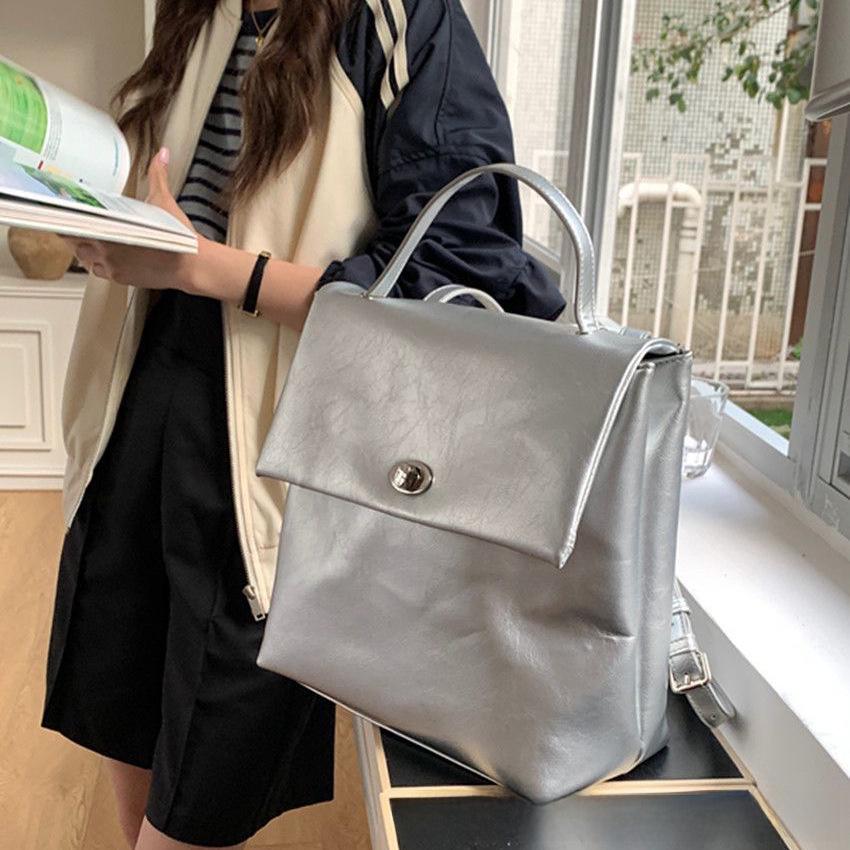 Модный корейский серебристый рюкзак 2025 года: Большая вместимость, повседневный и универсальный вариант для летних поездок женщин на работу