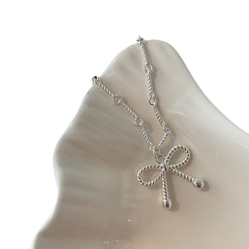Милое и крутое ожерелье с бантом в виде спирали, женский нишевый дизайн, чувство легкости, роскошь, элегантность, индивидуальность, мода, цепочка на шею, цепочка на ключицу