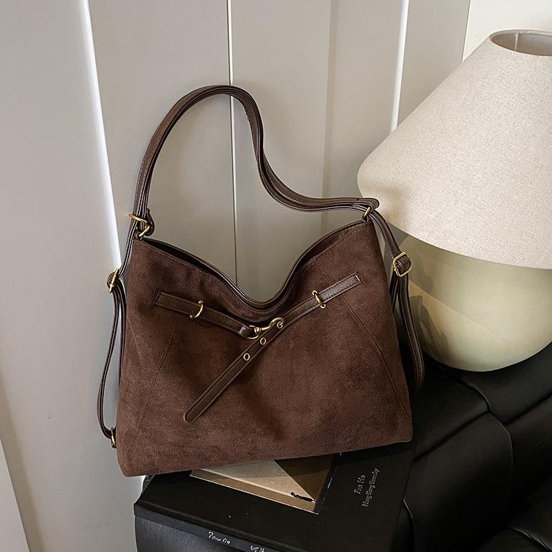 Retro commuter dumpling bag women's large capacity 2025 new niche shoulder bag multi-functional casual backpack backpack