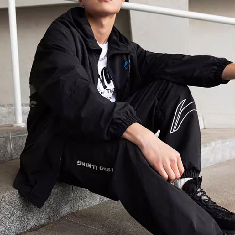 Мужские спортивные брюки Li Ning Lifestyle Series, однотонные, со шнуровкой, свободного кроя, с манжетами, черные AYKU663-1