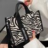 Canvas Bag Winter Style Women's High End and Versatile Women's Zebra Pattern Hand Held One Shoulder Crossbody Bag