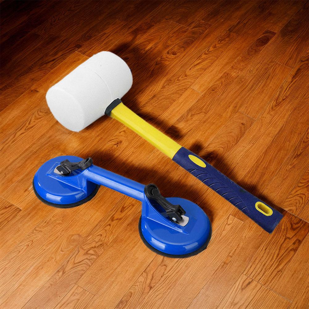 Инструмент для фиксации зазора в полу включает в себя присоску и синий набор молотков, стеклянные присоски для ремонта зазора в полу из ламината