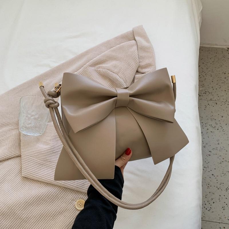 IELGY fresh and cute bowknot solid color casual shoulder bag