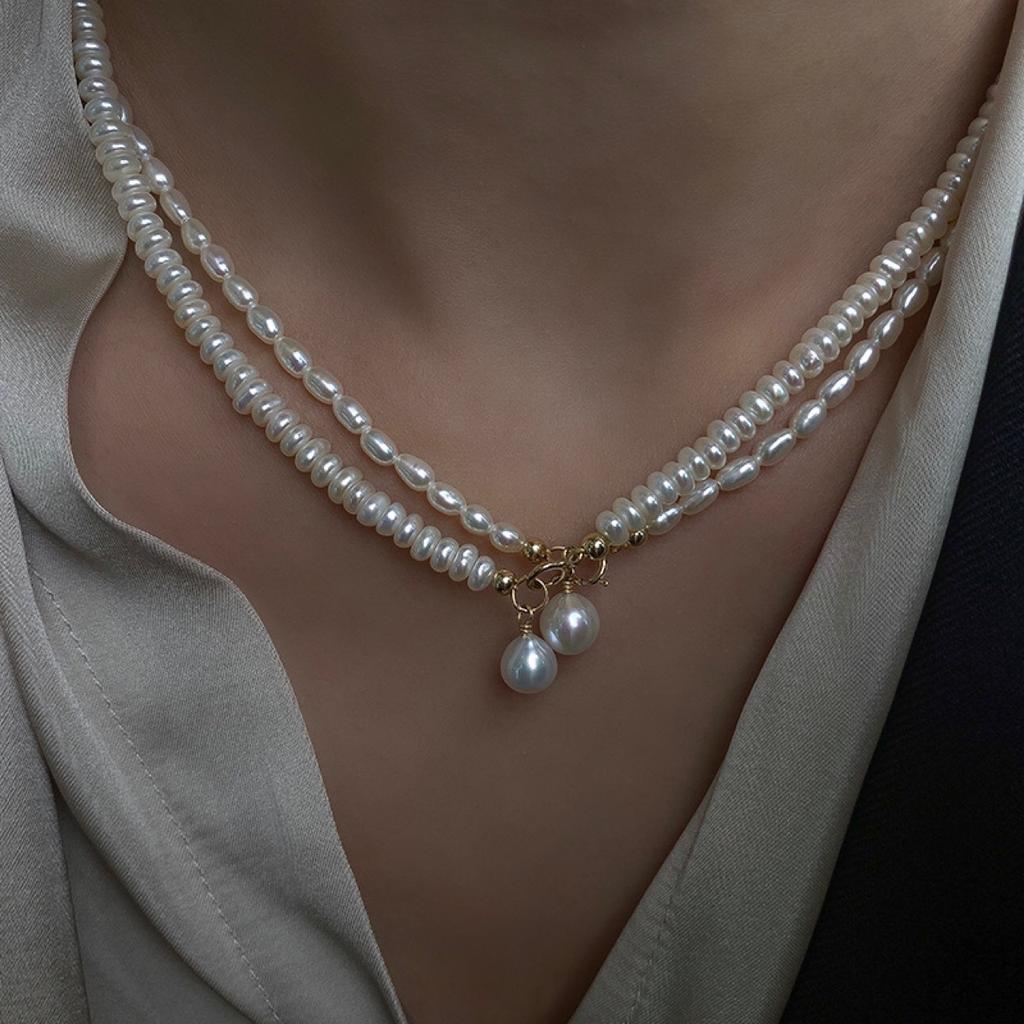 A two-in-one product/Natural millet pearl14K Gold-plated necklace, a delicate and understated clavicle chain for women, in a cool and minimalist