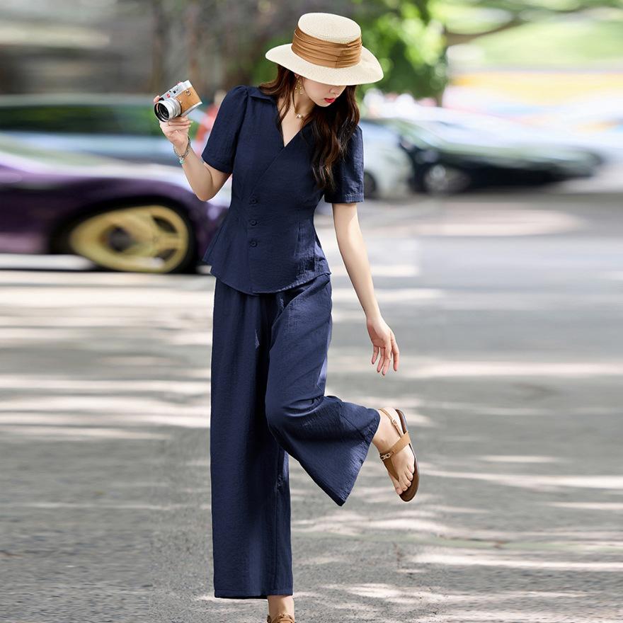 Дизайнерский модный костюм женский новый темперамент талия тонкая рубашка с коротким рукавом брюки клеш комплект из двух предметов