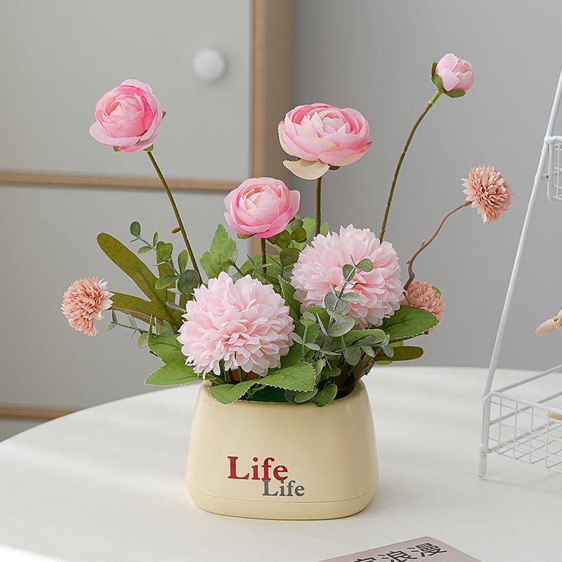 Living Room Decor: Artificial Sunflower and Green Plant Arrangements, Small Potted Plants, and Plastic Bouquets