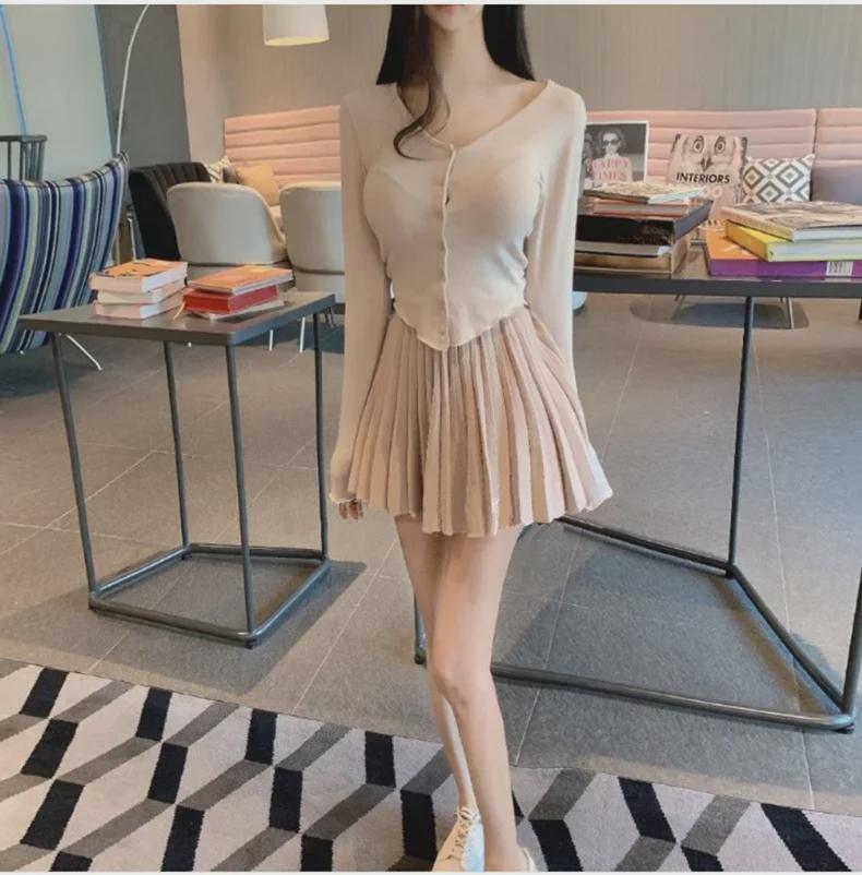 Нежный розовый женский кардиган с длинными рукавами и застежкой на пуговицы на груди