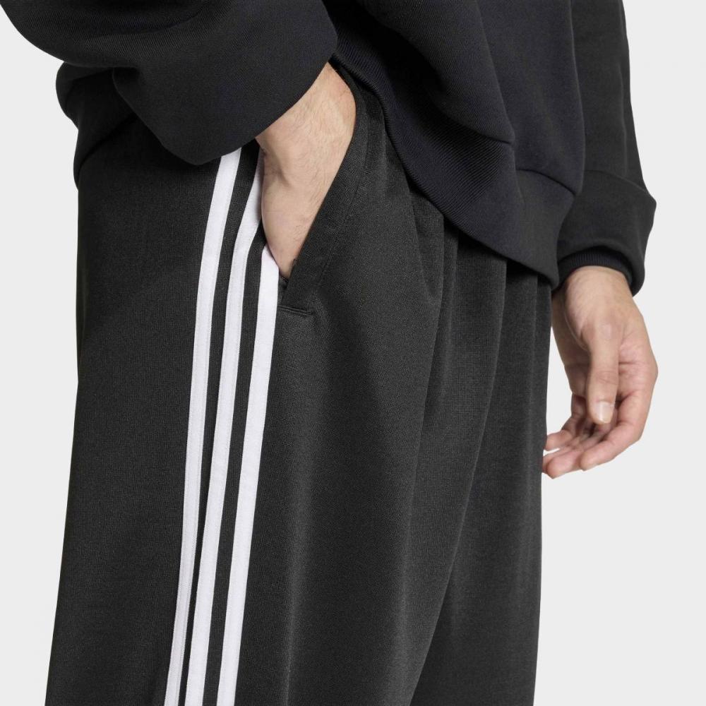 adidas Свободные спортивные штаны Adicolor Kc8534
