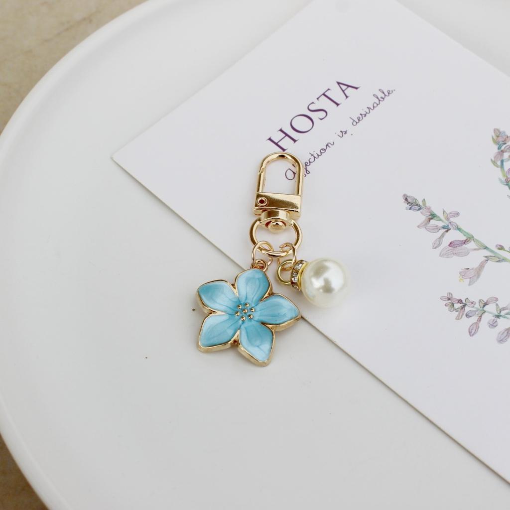 Новый очаровательный брелок в виде цветка сакуры с жемчужной подвеской и эмалью, украшение для женской сумки, брелок для ключей, аксессуар для автомобильных ключей.