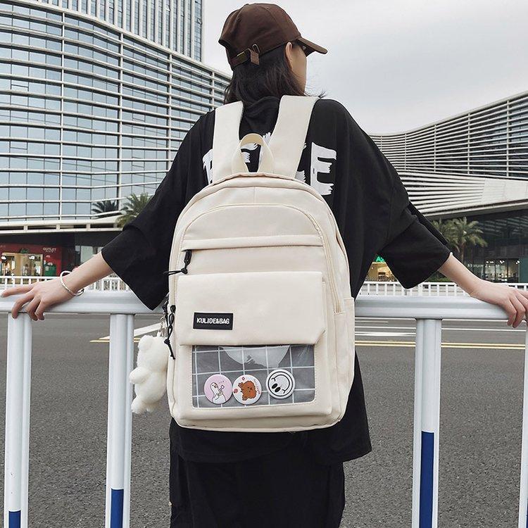Schoolbag female Korean version four-piece ins Mori versatile campus cool elementary school junior high school high school large capacity backpack