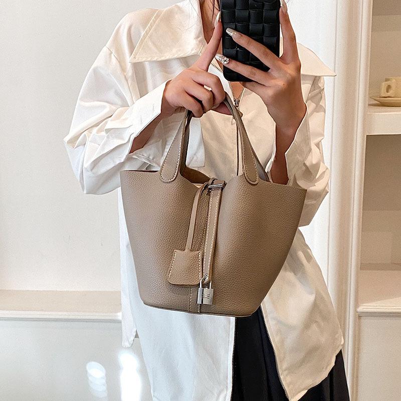 Сумка премиум-класса с нишевым дизайном, женская, новая популярная 2025 года, ручная сумка в иностранном стиле, универсальная, портативная сумка-ведро